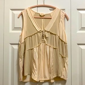 Sleeveless blouse, V-neck with 5 buttons in front, drapey